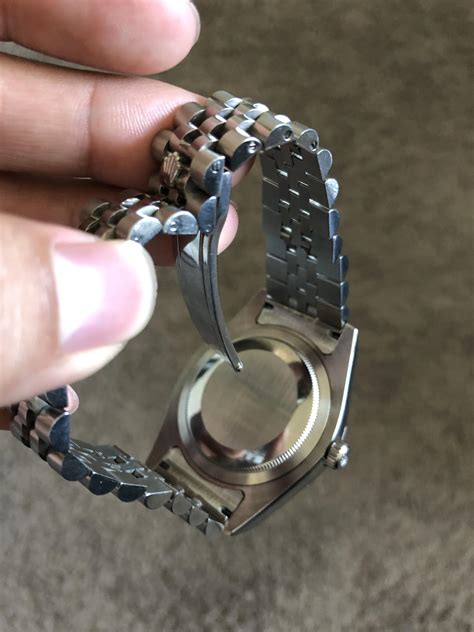 opening a Rolex watch band